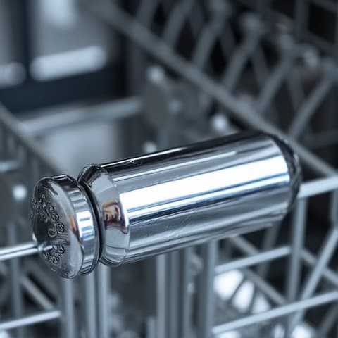 Thermador dishwasher heating element replacement by Fair Oaks expert. An expert technician in Fair Oaks is shown replacing the heating element of a Thermador dishwasher, ensuring proper drying function and thorough repair.